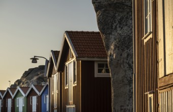 Boathouses between rocks in the harbour of Smögen, Smögenbryggan, Västra Götalands Län, Bohuslän,