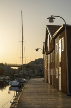 Boats and boathouses in the harbour of Smögen, Smögenbryggan, Västra Götalands Län, Bohuslän,