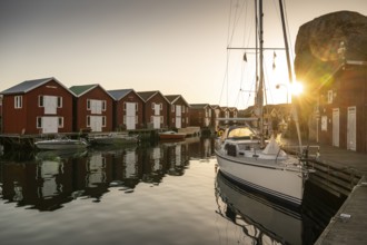 Boats and boathouses in the harbour of Smögen, Smögenbryggan, Västra Götalands Län, Bohuslän,