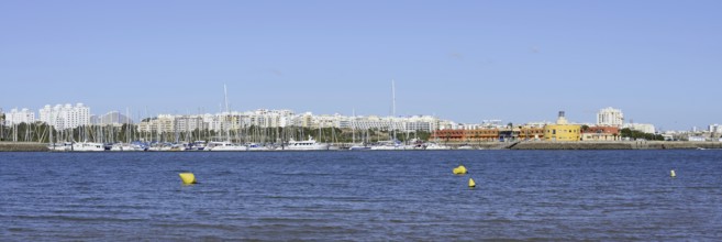 View from Ferragudo to Portimao with marina, Algarve, Portugal