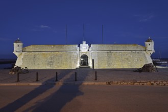 Forte da Ponta da Bandeira fortress by night, Lagos, Algarve, Portugal