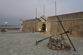Forte da Ponta da Bandeira fortress at dusk, Lagos, Algarve, Portugal