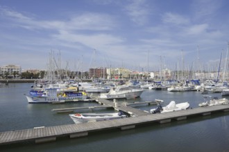 Pleasure boats and sailing boats in the marina, Lagos, Algarve, Portugal