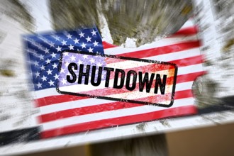 Torn sticker of US flag with shutdown printed on it, photomontage