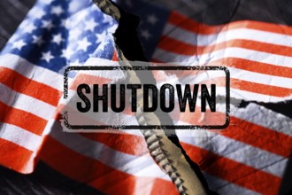 Torn US flag and Shutdown lettering, photomontage