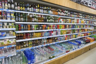 A supermarket shelf full of various drinks and refreshments, Gntunik supermarket, Aragazotn