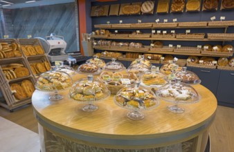Various pastries and breads are decoratively displayed in a bakery, Gntunik supermarket, Aragazotn
