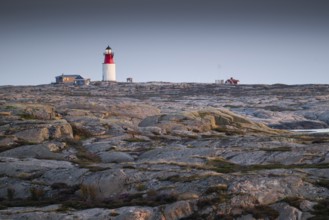 Lighthouse and houses in stony landscape, archipelago, Smögen, Smögenbryggan, Västra Götalands Län,