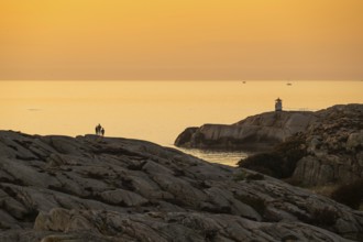 Small lighthouse at sunset, archipelago, Smögen, Smögenbryggan, Västra Götalands Län, Bohuslän,
