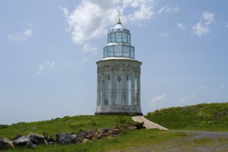 Glass church on a hill path, crowned by a golden cross under a cloudy sky, Garden of Eternity,