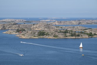 Rocky archipelago landscape with small house by the sea and boats, Fjällbacka, Bohuslän, West