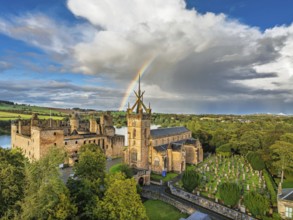 Rainbow over Linlithgow Palace from a drone, Linlithgow Loch, West Lothian, Scotland, United