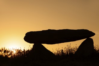 Dolmen at sunset, Finistere department, Brittany, France