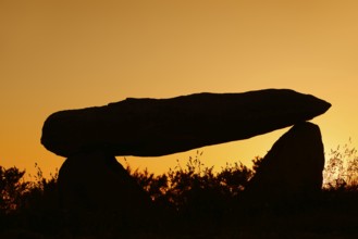 Dolmen at sunset, Finistere department, Brittany, France