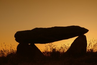 Dolmen at sunset, Finistere department, Brittany, France