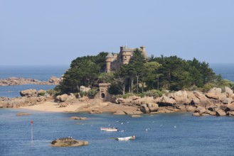 Rocky coast and Costaeres Castle, Ploumanac'h, Cote de Granit Rose, Cotes-d'Armor, Brittany, France