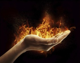 Hand with fire. The fire burning at the hand, AI generated