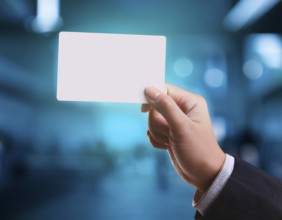 Hand holding a sheet of paper in hand.. AI generated image, ai