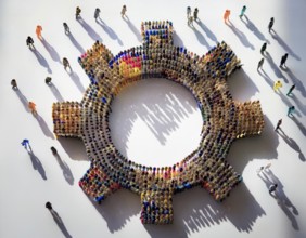 A diverse group of colorful individuals forms a gear shape, emphasizing collaboration, connection,