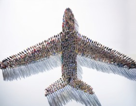 A creative illustration emphasizing teamwork and unity, depicting people arranged to shape an