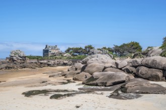 View from the harbour beach of Trégastel on the Côte de Granit Rose at low tide over the iconic