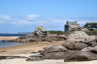 View from the harbour beach of Trégastel on the Côte de Granit Rose at low tide over the iconic
