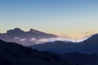 View from Furkajoch a mountain range above a sea of fog, dawn, dawn, autumn, Vorarlberg, Austria