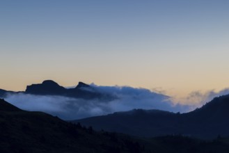 View from Furkajoch a mountain range above a sea of fog, dawn, dawn, autumn, Vorarlberg, Austria