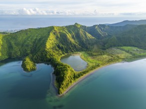 Lagoa do Fogo Lake on Sunny Morning. Green Lush Hills and Mountains. Azores, Sao Miguel Island.