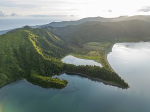 Lagoa do Fogo Lake on Sunny Morning. Green Lush Hills with Forest and Mountains. Azores, Sao Miguel