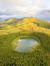 Hills, Forest and Lake Lagoa do Canario at Sunset. Azores, Sao Miguel Island, Portugal. Aerial View