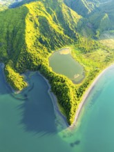 Lagoa do Fogo Lake on Sunny Morning. Green Lush Hills with Trees. Azores, Sao Miguel Island.