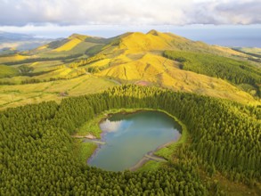 Hills, Forest and Lake Lagoa do Canario at Sunset. Azores, Sao Miguel Island, Portugal. Aerial View