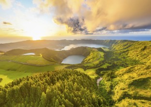 Panorama of Sete Cidades Caldera at Sunset. Blue Lake, Lake Rasa and Santiago Lake. Forest and
