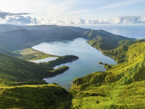 Lagoa do Fogo Crater Lake at Sunrise. Green Lush Hills and Mountains. Azores, Sao Miguel Island.
