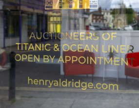 Sign on glass entrance door Henry Aldridge auctioneers of Titanic and Ocean Liner memorabilia,