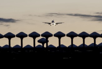 Landing of an aircraft at BER Berlin Brandenburg Willy Brandt Airport, Wullenweber antenna for