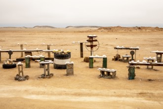 Pink salt displayed on wooden stands along the road to Namib-Naukluft National Park and Sandwich