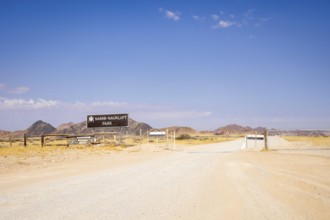 Entrance gate of Namib-Naukluft Park in Namibia - 27 August, 2025: with mountains in the background