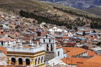 Building backdrop with historical charm, surrounded by mountainous landscape and nature, view over