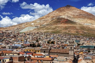 Versatile city with red roofs and a striking mountain in the background, the Cerro Rico silver