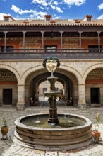 Historic courtyard with decorative fountain and arcades, The courtyard with fountain in the museum