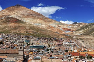Panorama of a city at the foot of a mountain under a blue sky in the Andes, The silver mountain