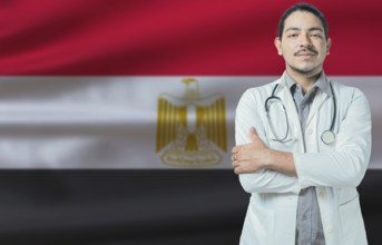 Male doctor on Egypt flag. Doctor with crossed arms on Egypt flag. Egypt health and care concept