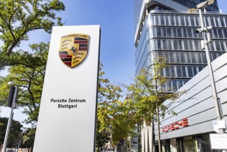 Porsche Centre Autohaus am Pragsattel. Porsche Design Tower skyscraper. Logo on a stele. Stuttgart,