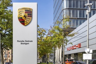 Porsche Centre Autohaus am Pragsattel. Porsche Design Tower skyscraper. Logo on a stele. Stuttgart,