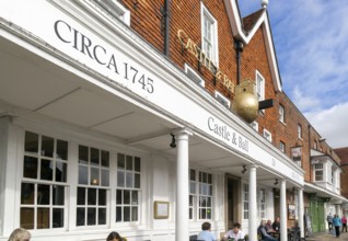 Frontage of historic building, Castle and Ball hotel public house, Marlborough, Wiltshire, England,