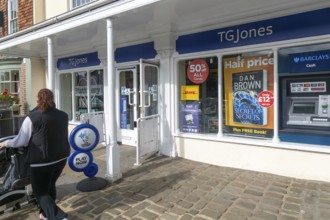 TG Jones shop signage rebranded WH Smith store, High Street, Marlborough, Wiltshire, England, UK
