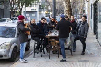 Street scene with musician, Palermo neighbourhood, Buenos Aires, capital of Argentina