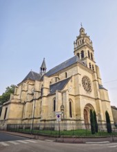 The historic Church Eglise Saint-Martin de L'Isle-Adam in France. Impressive stone architecture,